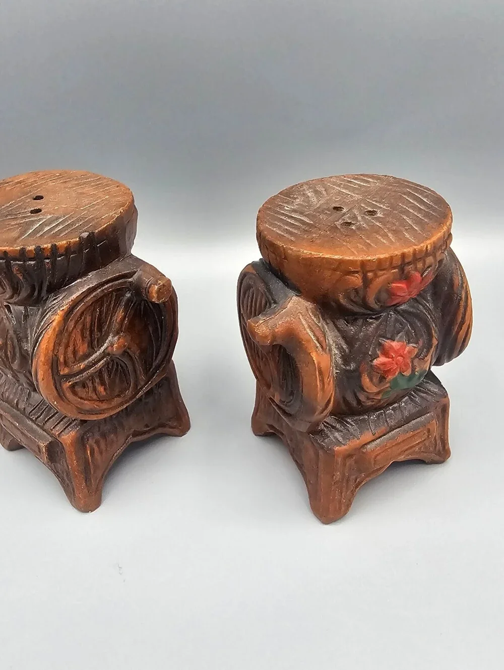 Vintage Hand-Carved Wooden Salt and Pepper Shakers with Floral Design